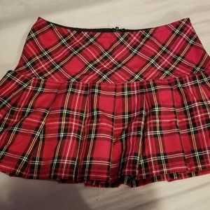 Pleated plaid mini skirt